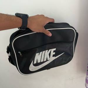 Tnis Nike, Chinelo Nike, Bolsa Nike