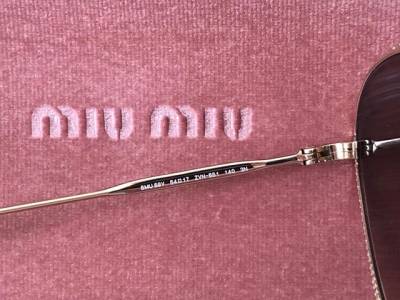 culos Miu Miu Eyewear
