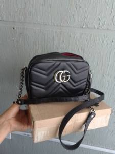 Bolsa Gucci.