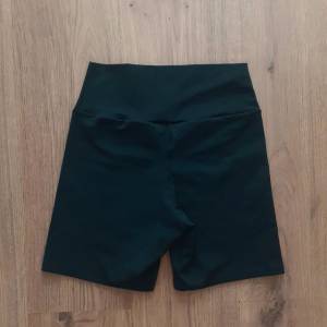 Short Legging Preto Feminino Liso Bsico Brech