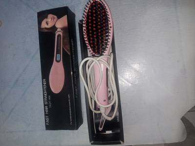 Escva Alisadora. S 60 Reais.