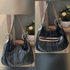 Bolsa Em Couro Tpz