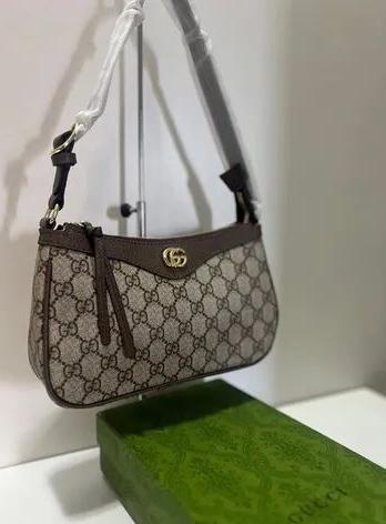 Bolsa Gucci Monograma